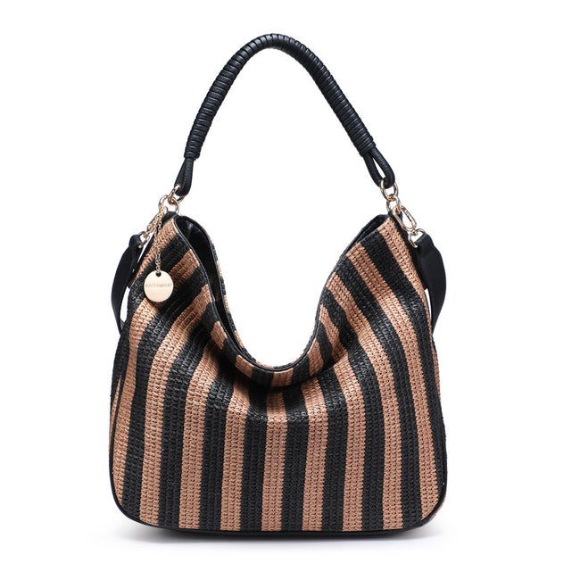 Black and brown striped slouchy shoulder bag with a wrapped handle and a round charm.