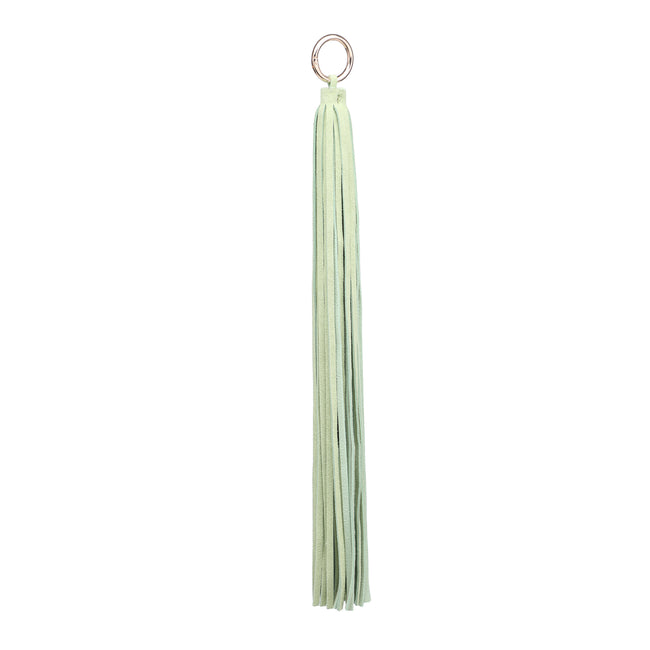 Long pale green tassel charm with a round metal ring