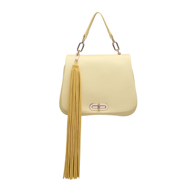 Front view of a pale yellow flap handbag with a short handle, gold-tone clasp and long tassel.