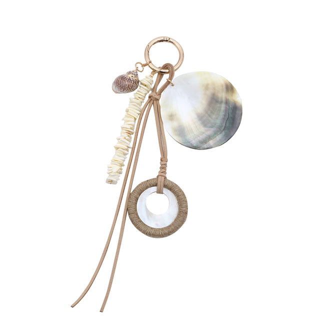 Keyring with a large iridescent round pendant, a wrapped ring charm, pale beads and long tan cords.