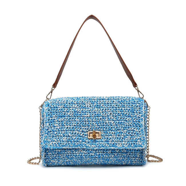 Front view of a blue and cream textured flap bag with a brown shoulder strap and gold-tone clasp.