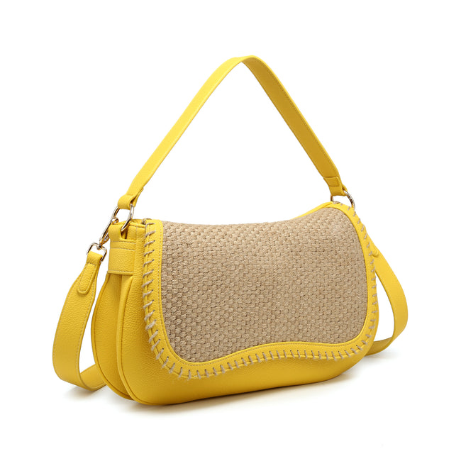 Angled view of a yellow shoulder bag with a beige woven-texture flap and whipstitched trim.
