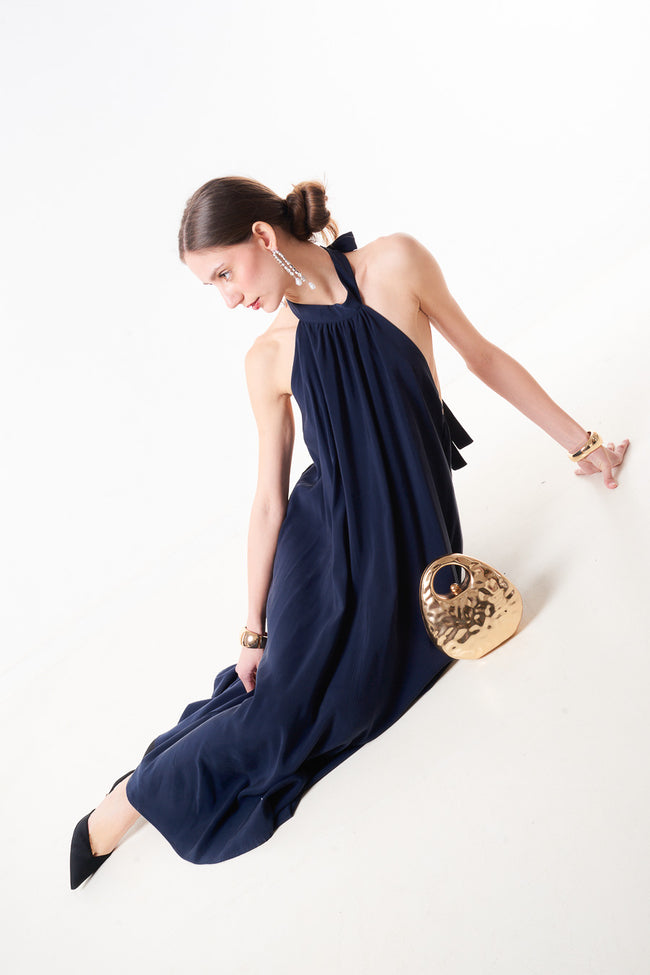 Dark blue halter-neck viscose-blend midi dress with flowing front pleats, back-neck tie and open back