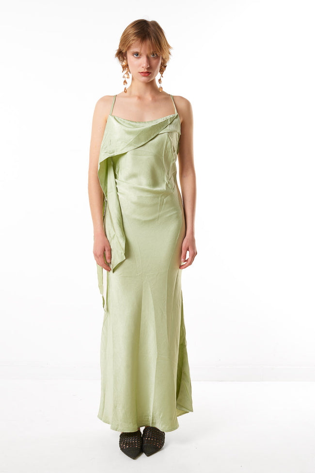 Light green satin-finish maxi dress with thin shoulder straps and asymmetric draped front