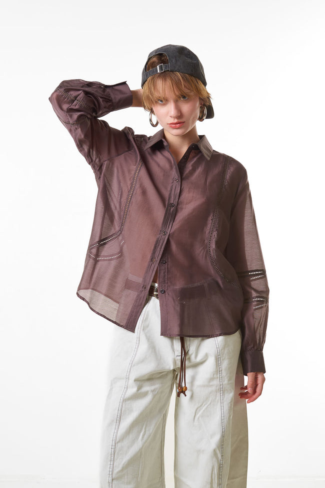 Coffee brown sheer button-front shirt with pointed collar, decorative stitched panels and long cuffed sleeves
