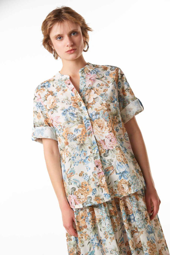Beige floral cotton floral button-front blouse with short turned-cuff sleeves