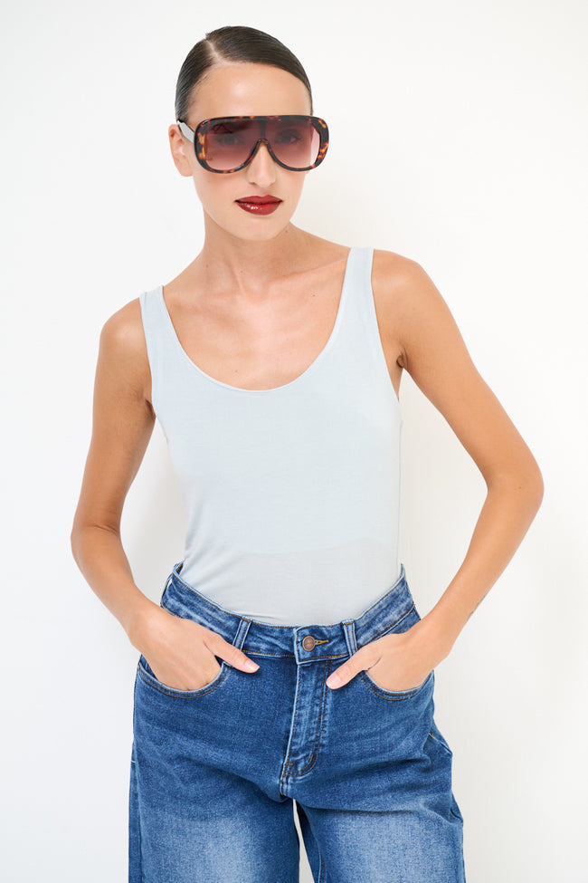 Light grey fitted sleeveless stretch top with a scoop neckline
