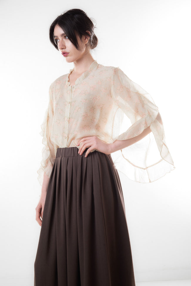 White cream sheer floral-print lyocell-blend blouse with flowing ruffle sleeves and button front