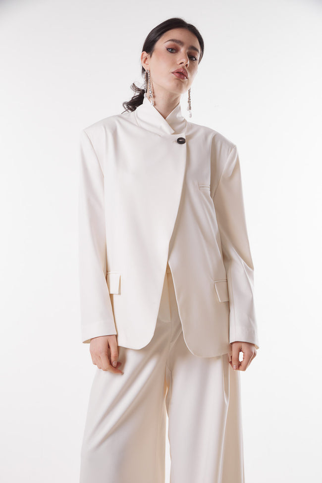 White cream structured high-neck blazer with asymmetric single-button front and flap pocket details