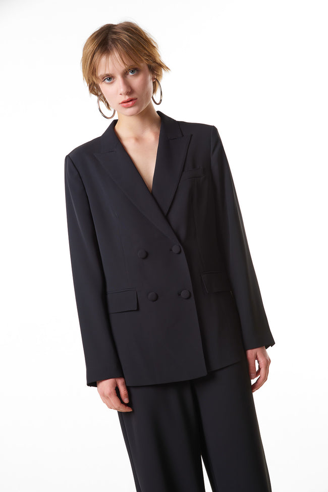 Black double-breasted blazer with notched lapels, front flap pockets and chest pocket detail