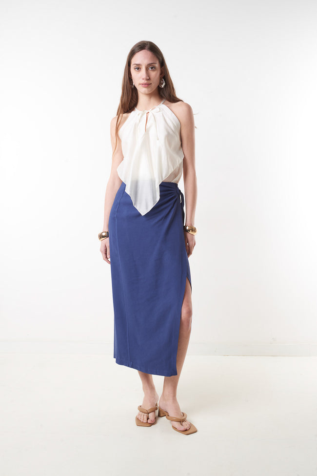 Dark blue wrap-style midi skirt with side waist tie, ring detail and front slit