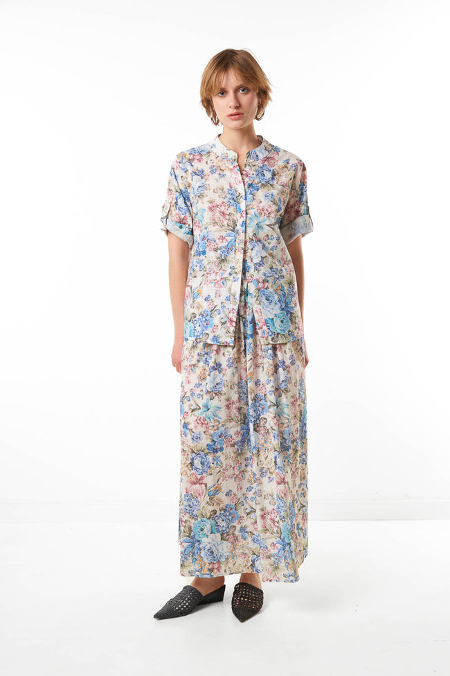 Light blue floral cotton maxi skirt with all-over floral print and flowing silhouette