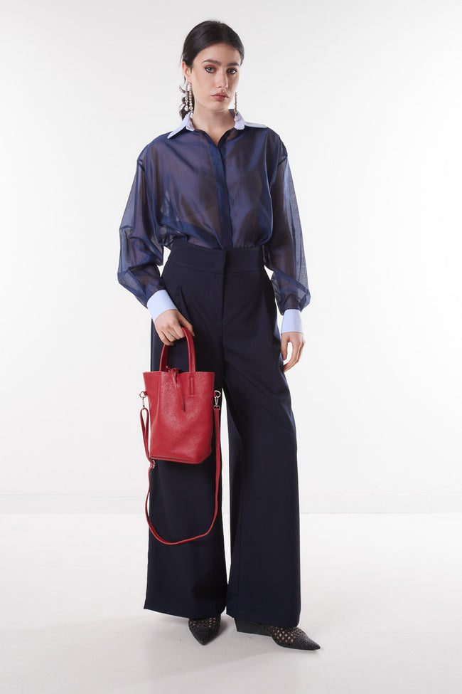 Dark blue high-waist wide-leg tailored trousers with front pleat detail, side pockets and full length