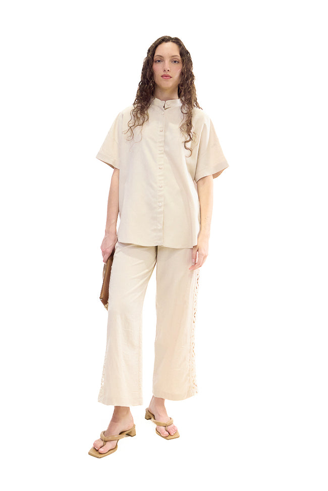 Beige cropped straight-leg viscose-linen trousers with contrast crochet-style lace side panels and side pockets