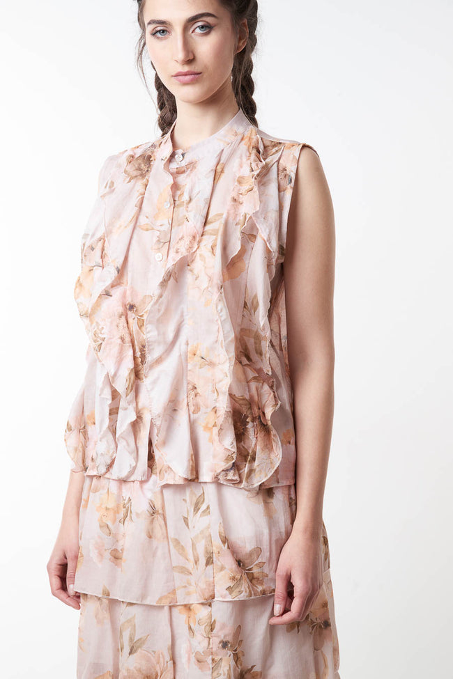 Beige floral sleeveless floral button-front blouse with cascading front ruffles and layered hem