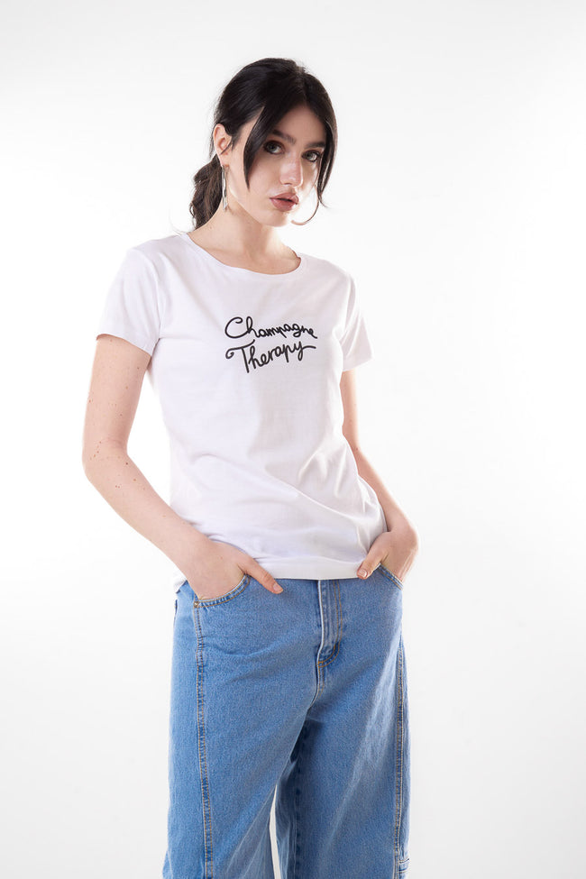 White cotton round-neck short-sleeve T-shirt with black Champagne therapy script