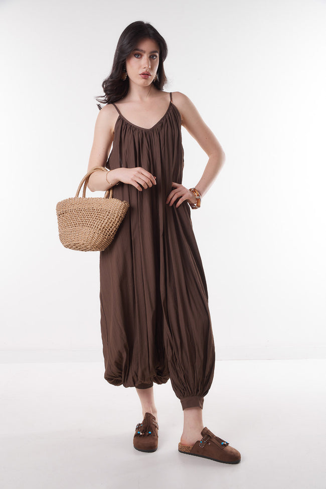 Coffee brown loose flowing thin-strap jumpsuit with gathered neckline, low back and elasticated ankle cuffs