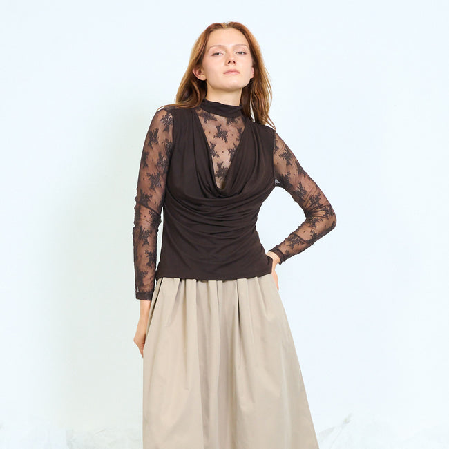 Coffee brown draped cowl-front blouse with high floral lace neckline, sheer long lace sleeves and lace upper-back panel; beige long skirt and shoes styled separately