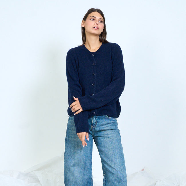 Navy round-neck cardigan with small buttons and long sleeves