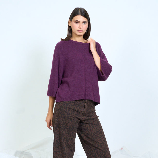 Purple round-neck sweater with loose elbow-length sleeves