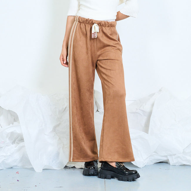 Front view of camel wide-leg drawstring trousers with contrasting side stripes