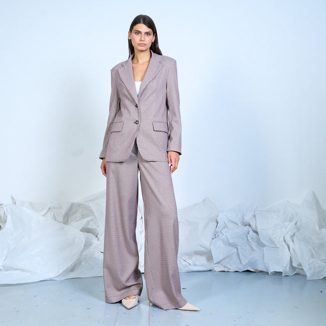 Fine burgundy and cream checked blazer worn with matching wide-leg trousers