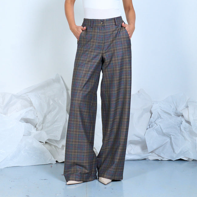 Gray plaid wide-leg trousers with muted blue and yellow lines, front view