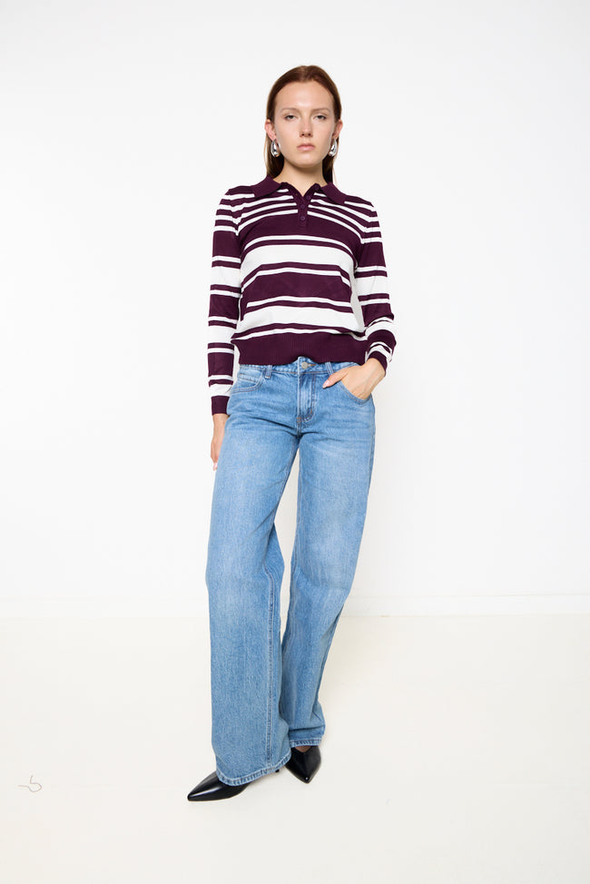Bordeaux and cream horizontal-striped polo-collar knit sweater with front button placket, long sleeves and ribbed cuffs and hem; jeans and earrings styled separately